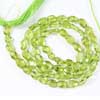 Natural Green Peridot Faceted Oval Beads Strand Length 14 Inches and Size 5mm to 6mm approx.